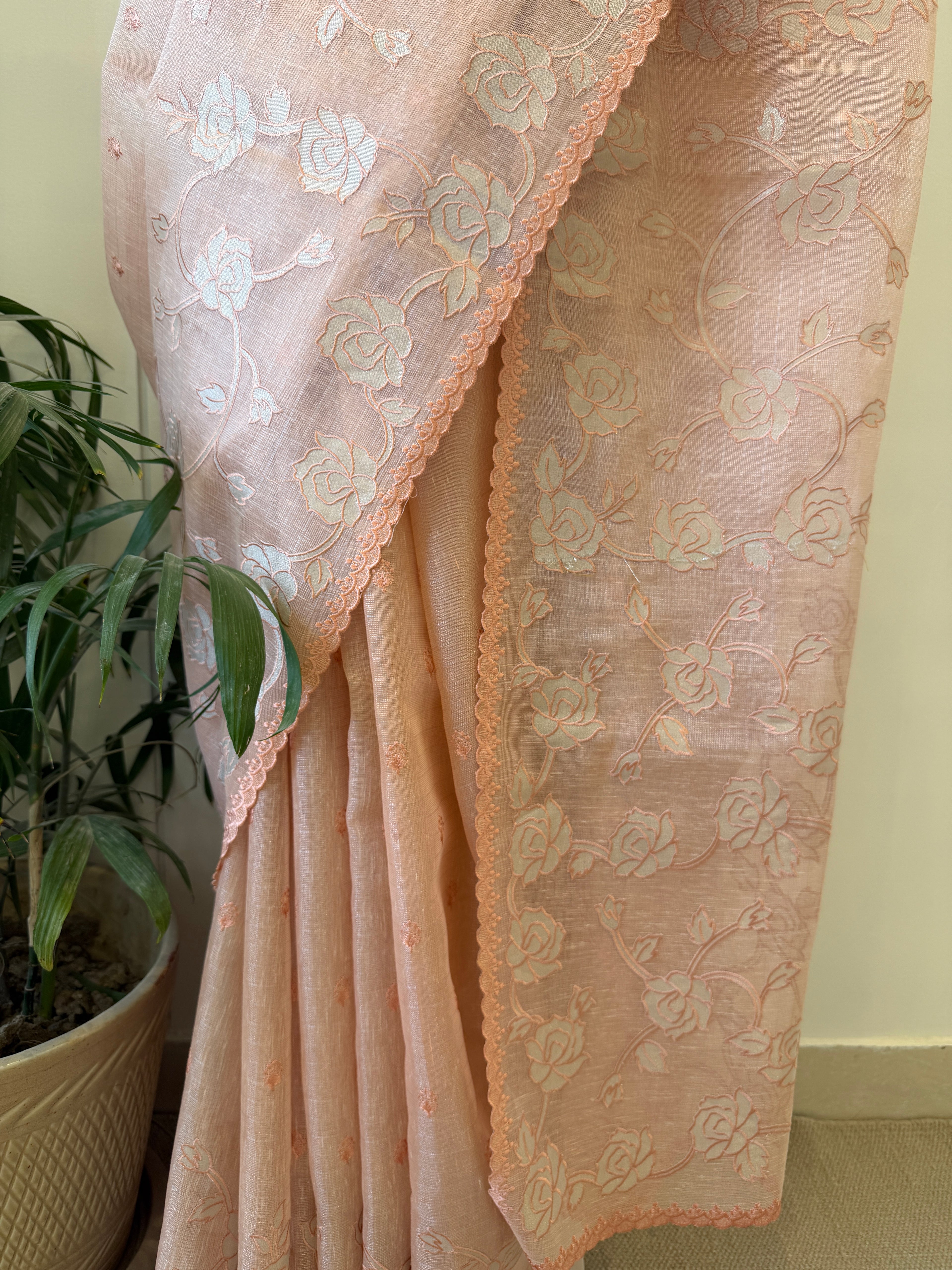 Linen tissue saree with applique work and scallop border – Peach