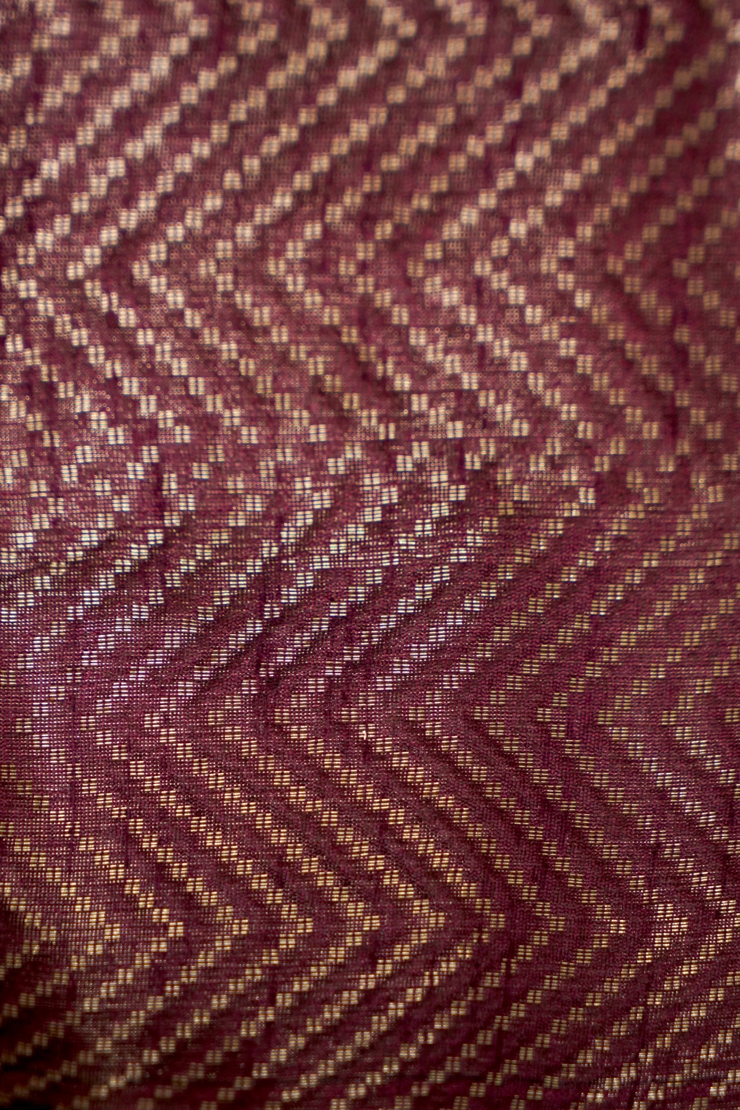 Tissue Silk Saree with Ikat-Inspired Weaving & Floral Buta – Antique Gold & Wine