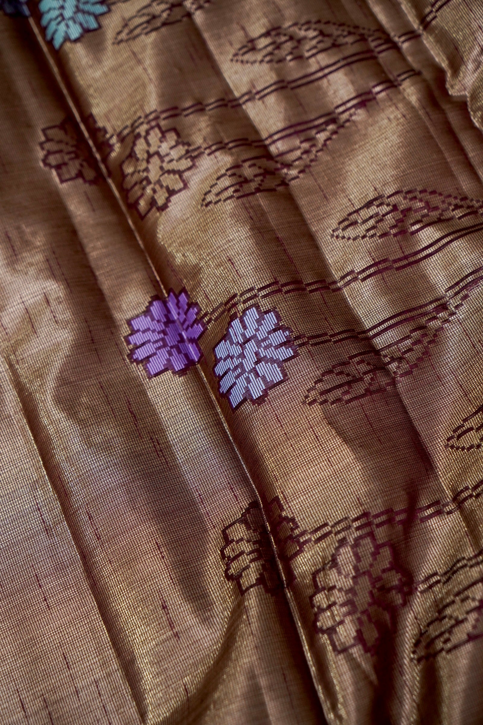 Tissue Silk Saree with Floral Weaving & Temple Border – Antique Gold & Wine