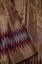 Tissue Silk Saree with Ikat-Inspired Weaving & Floral Buta – Antique Gold & Wine