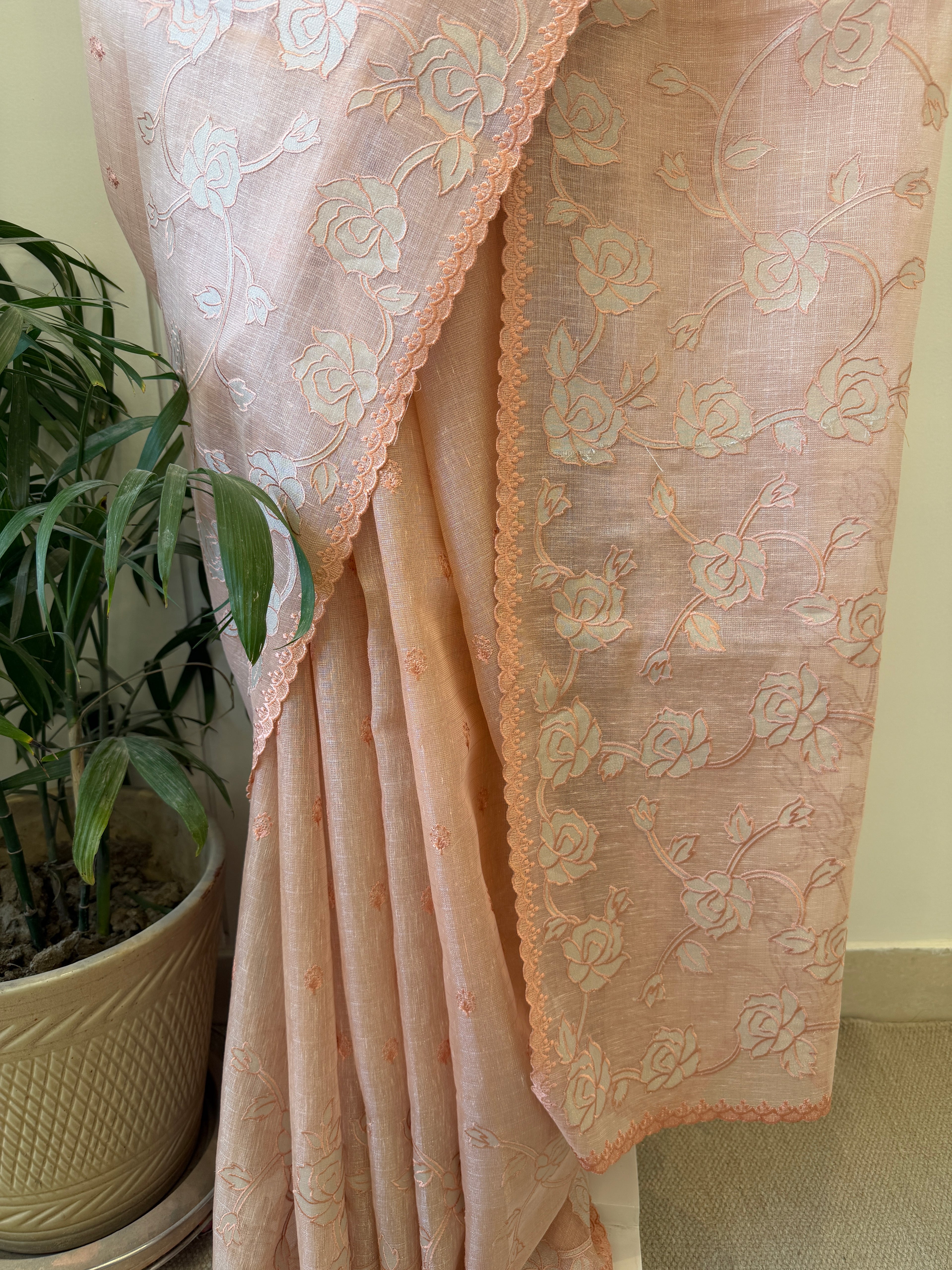 Linen tissue saree with applique work and scallop border – Peach