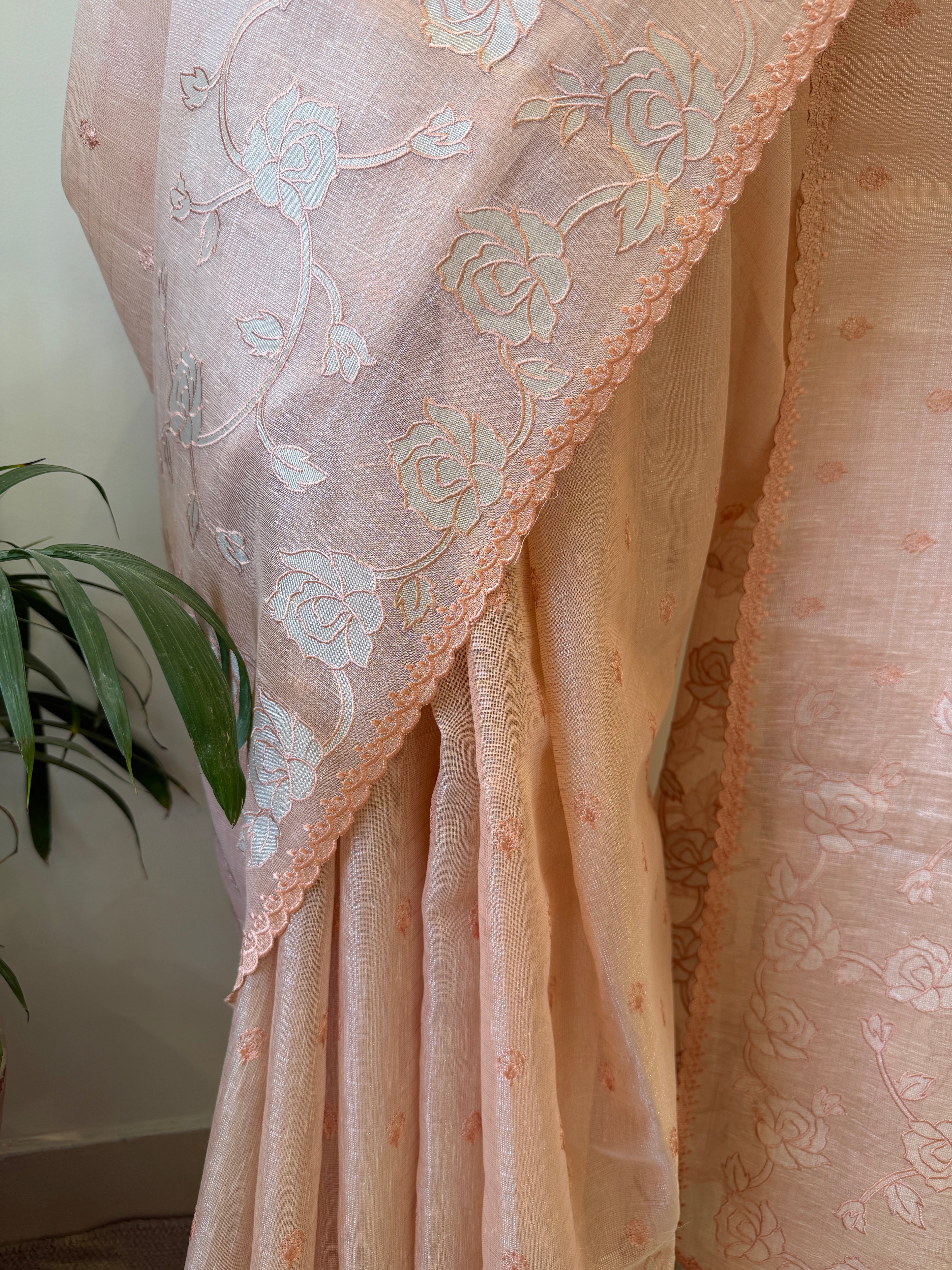 Linen tissue saree with applique work and scallop border – Peach