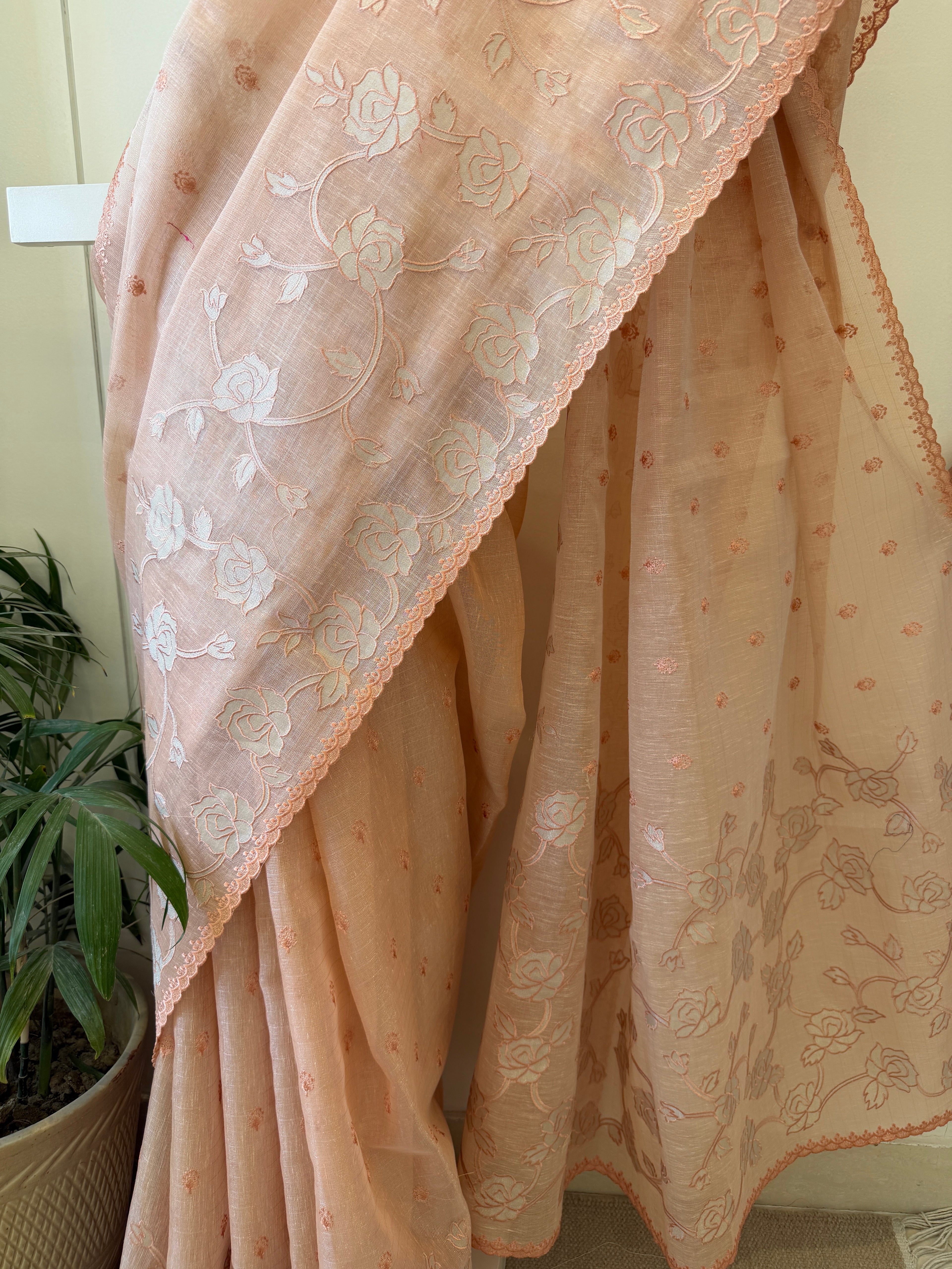 Linen tissue saree with applique work and scallop border – Peach